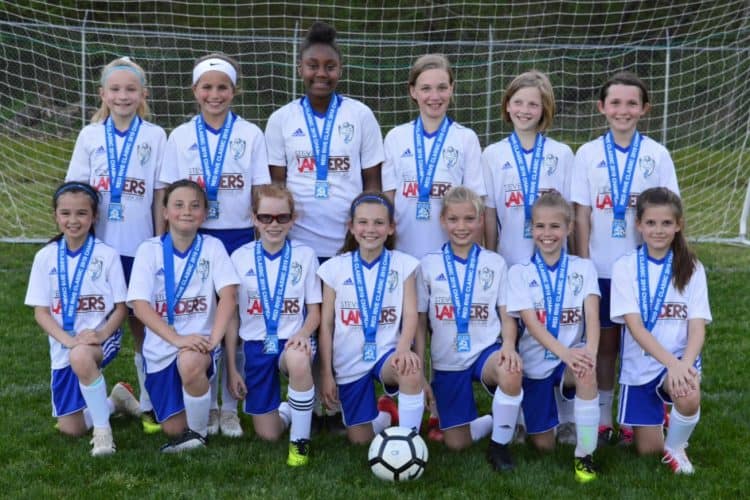 Players (back row from left): Brooklyn Kuchinski, Presley McNab, Toni Williams, Lydia Hall, Anabelle Tappe and Mattison Roberts; players (front row from left): Raegan Leung, Jadyn Heiderscheidt, Emma Roach, Brooke Fluger, Carys Williams, Bethany Arbeene and Eloise Prather. - Story by Jeff Hall; Photo by Sarah Hall