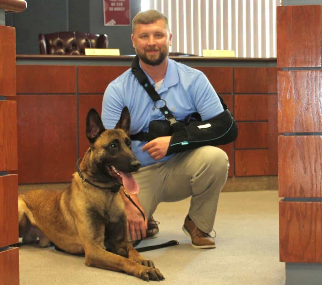 K9 Nino is pictured with his handler Officer Chase Collins.