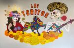 East End teacher and advanced 8th grade art class students paint vibrant mural at local restaurant